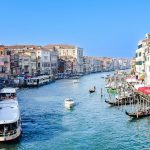 A beautiful scenic view of Venice’s canals and gondolas.