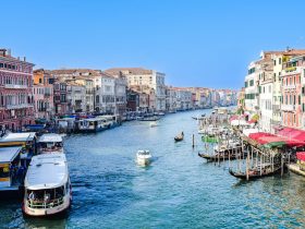 A beautiful scenic view of Venice’s canals and gondolas.