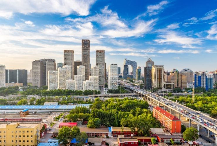 A panoramic view of Beijing's skyline featuring modern skyscrapers and traditional architecture.