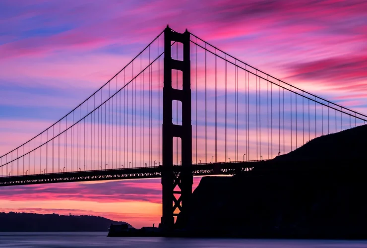 California coastline with Golden Gate Bridge and sunset view