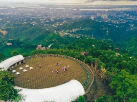 Stunning panoramic view of Cebu City showcasing its vibrant urban landscape, beaches, and natural beauty.