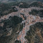 Panoramic view of Centuripe, Sicily, highlighting its distinctive hilltop layout and surrounding landscape.
