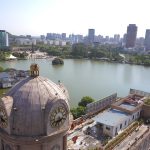 Wuhu city skyline with Yangtze River in the foreground, showcasing the city’s blend of modern and historical architecture.